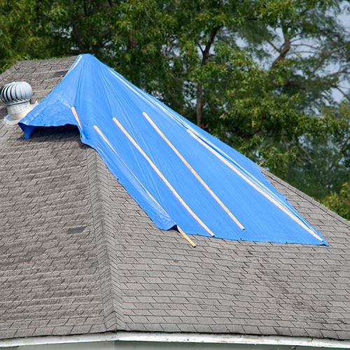 roofing contractor Yukon OK temporary tarp after storm damage