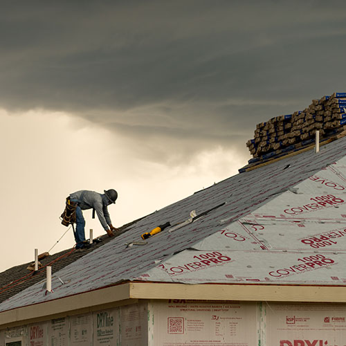 Roof repair Oklahoma City home being professionally repaired