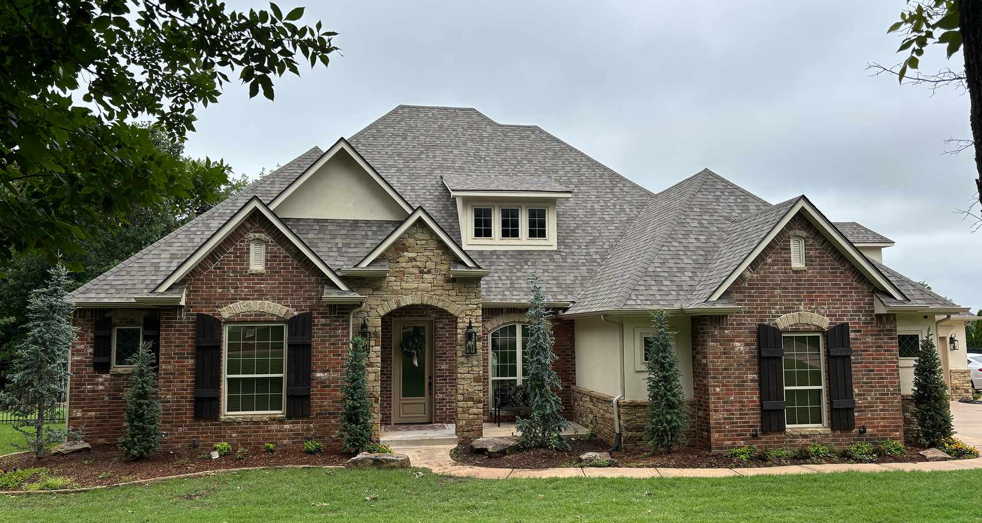 Recently completed roof replacement on a home in Oklahoma City by Hart Roofing & Construction